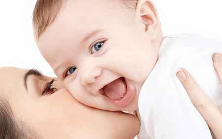 mother kissing baby homepage