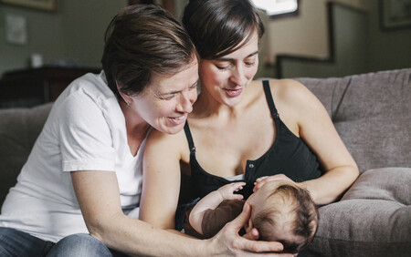 two women and baby