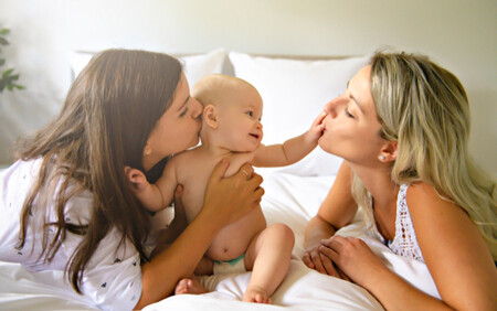 two women and baby