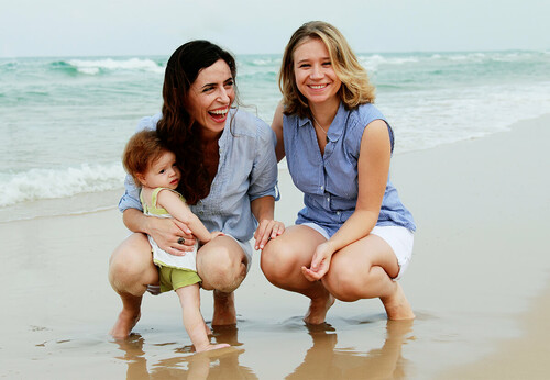 same sex couple at beach