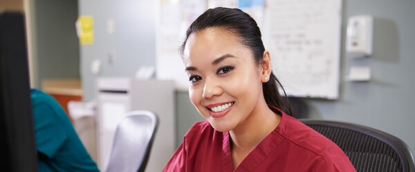 Nurse in pink scrubs