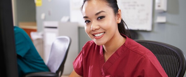 Nurse in Pink Scrubs