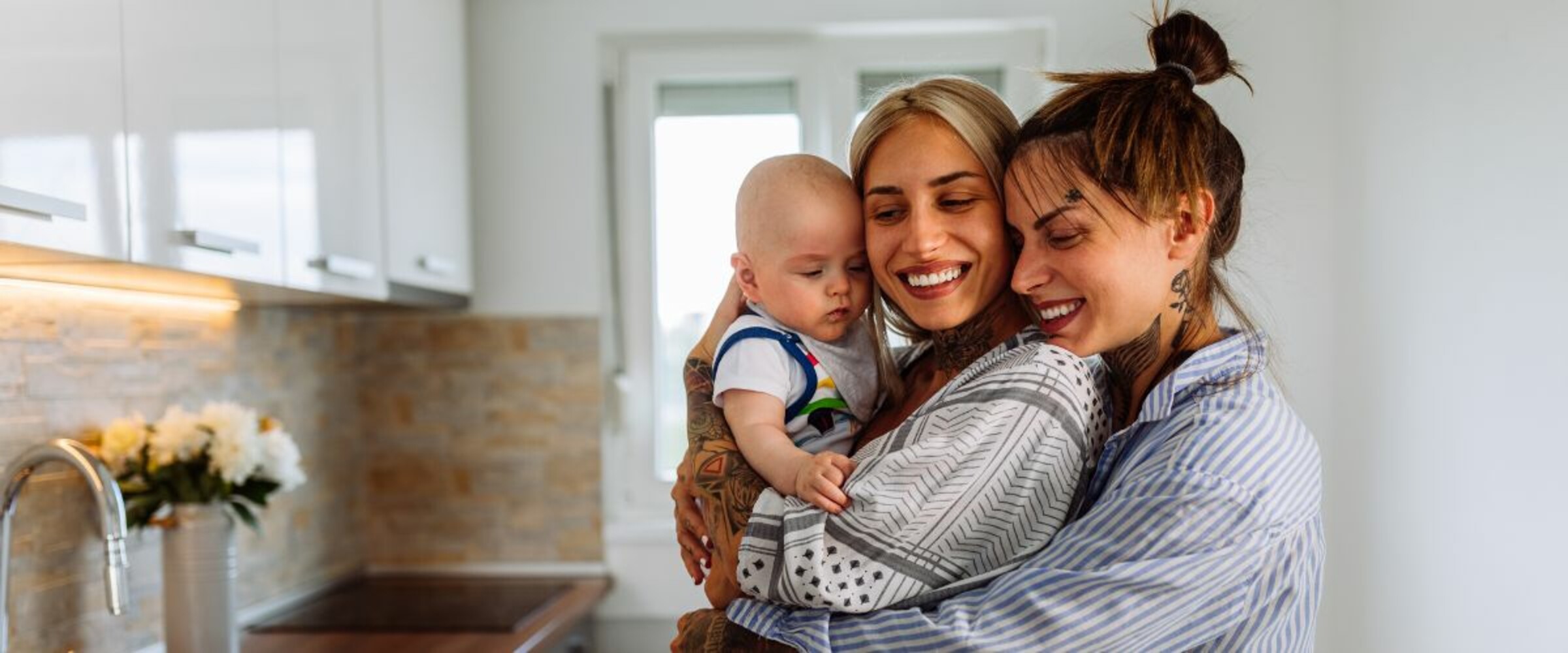 same sex couple with baby
